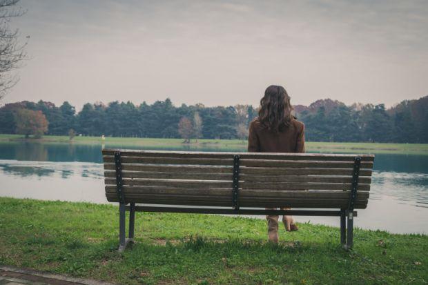 Student sitting on bench