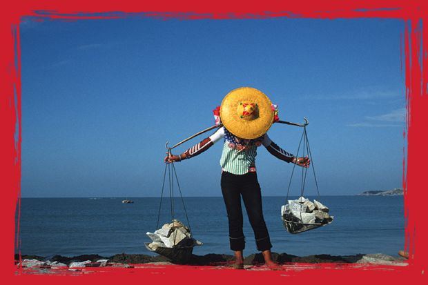 A young girl carrying granite blocks in China to illustrate Hidden strengths