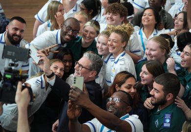 Labour leader Keir Starmer takes a selfie with students  in Worcester, United Kingdom to illustrate University staff overwhelmingly back Labour – with reservations